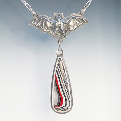 Bat Pendant with Dangling Fordite