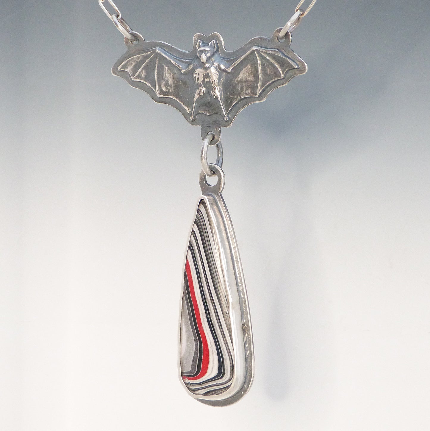 Bat Pendant with Dangling Fordite