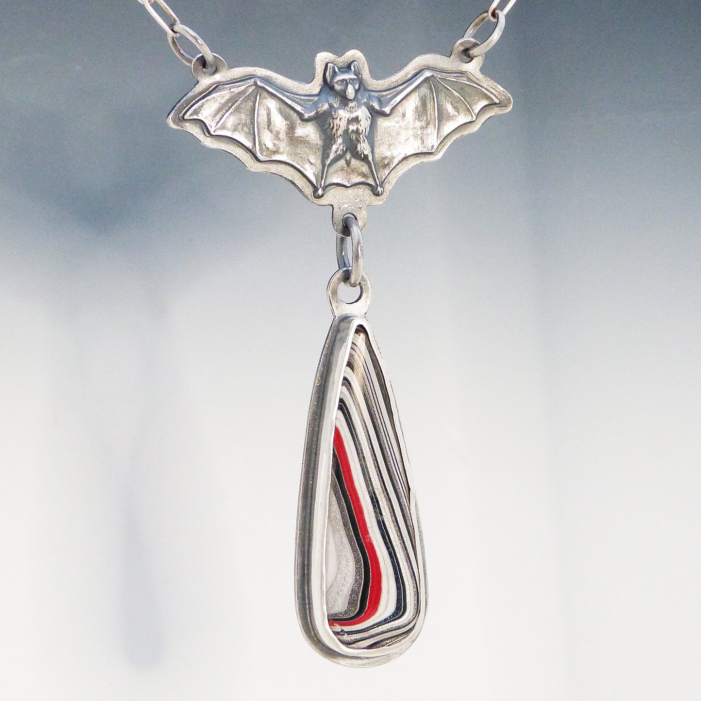Bat Pendant with Dangling Fordite