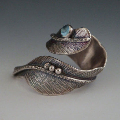 Adjustable Sterling Silver Topaz Feather Ring